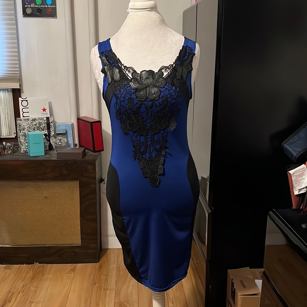 Blue and black dress  a large floral lace piece down front center